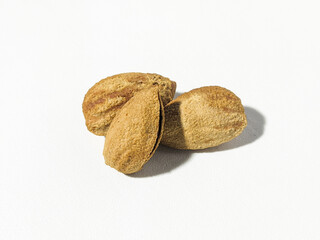 Almond seeds isolated on a white background, Fresh chocolate almonds