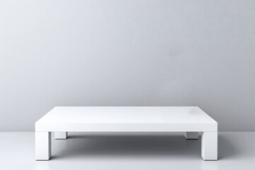 Minimalist empty white table against light gray wall, creating serene and modern atmosphere. Perfect for contemporary interior design