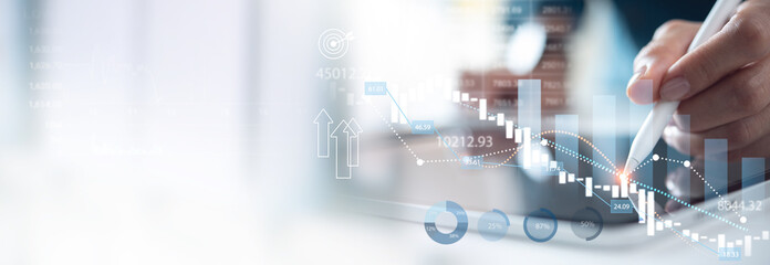 Financial account and investment concept. Business man analyzing market data, financial graph...