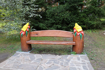 Decorated wooden bench around Strbske pleso, High Tatras, Slovakia. 