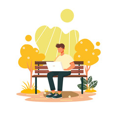 Man Working on Laptop Outdoors in the Park