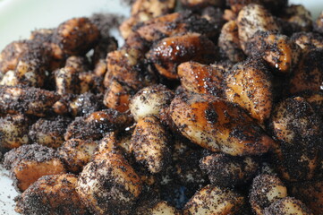 Close up of m&aacute;kos guba (poppy seed bread & butter pudding) - one of the most important Hungarian Christmastime meals 