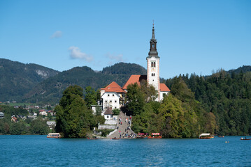 The island and the church in the middle of Lake Bled in the Julian Alps (Slovenia). We see the...
