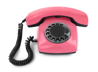 Old salmon color telephone with rotary dial isolated on white