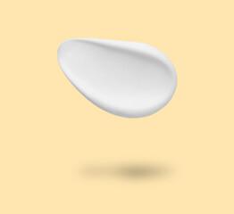 Cosmetic product in air on beige background