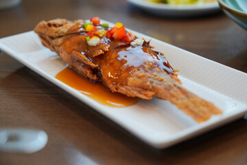 a fish dish that is deep-fried and sauteed