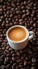 Fototapeta premium Freshly Brewed Coffee in a Cup Surrounded by Roasted Coffee Beans