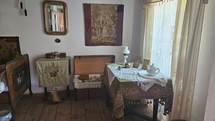 Cozy vintage room with a small table and antique decor