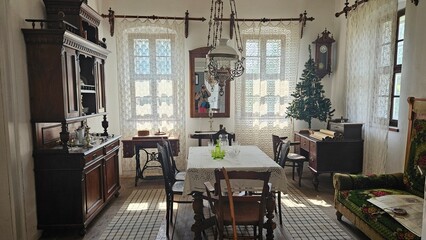 Traditional dining room with vintage furniture and wooden decor