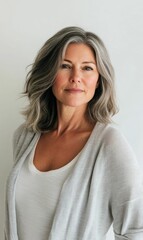 Fototapeta premium Woman with grey hair in grey cardigan.