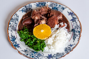 Traditional and true Brazilian feijoada prepared with the most authentic and classic ingredients