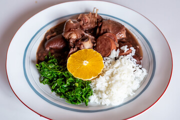 Traditional and true Brazilian feijoada prepared with the most authentic and classic ingredients