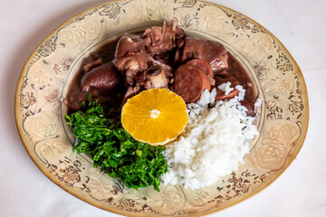 Traditional and true Brazilian feijoada prepared with the most authentic and classic ingredients