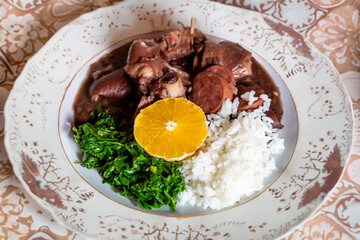 Traditional and true Brazilian feijoada prepared with the most authentic and classic ingredients