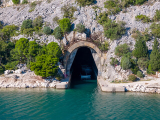 Drone photo of an old Yugoslavia u-boot bunker in the mountain.