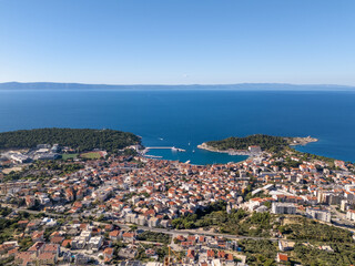 Obraz premium Aerial drone photo of the bay and coastal town of Makarska in Croatia.