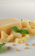 Authentic Italian Parmigiano Reggiano: Aged Cheese Wedge Isolated on White Background