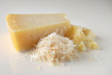 Authentic Italian Parmigiano Reggiano: Aged Cheese Wedge Isolated on White Background