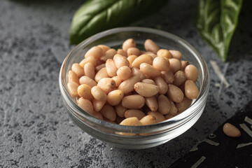 Shelled Pine Nuts: Close-Up of Roasted Siberian Seeds on Black Background