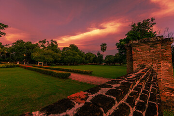 Background atmosphere inside the important historical tourist attraction Sukhothai Historical Park,foreign tourists from all over the world like to bring their children study history during holiday.