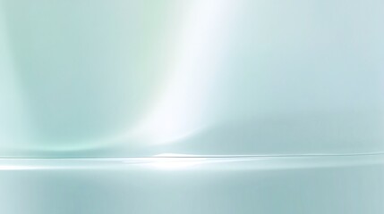 Abstract background with a soft, pale green gradient and a subtle light effect.