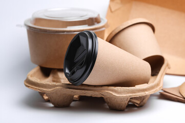 Cardboard disposable takeaway tableware on white background