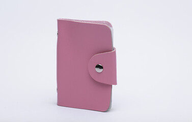 Leather pink cardholder or wallet on white background