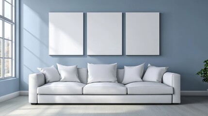 Serene living room decorated in a minimalistic style, featuring a comfortable white sofa and large bright windows for natural light.