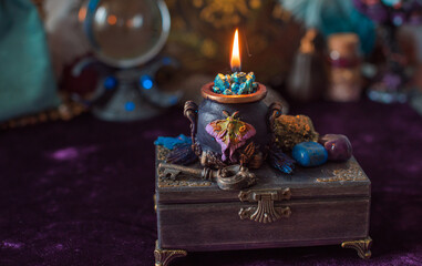 Negative energy is burning out. Mystical scene for esoteric content, candle is burning, flame. Fate and prediction 