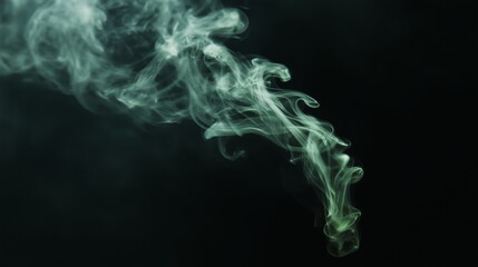 A wisp of green smoke against a black background, taken with a wide-angle lens.