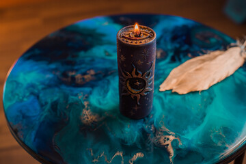 Negative energy is burning out. Mystical scene for esoteric content, candle is burning, flame. Fate...