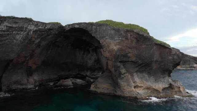 Immense Arc Rock Formation From the Cueva Del Indio in Arecibo, Puerto Rico, on a Cloudy Day.