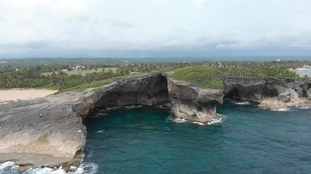 Immense Arc Rock Formation From the Cueva Del Indio in Arecibo, Puerto Rico, on a Cloudy Day.
