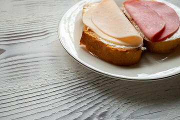 cultural spanish snack meat, cheese and tomato tapas sandwiches