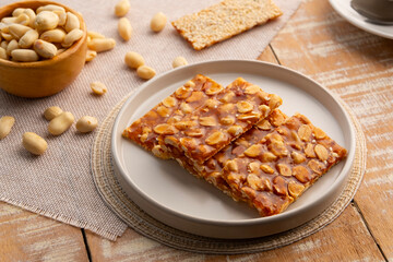 Chinese Peanut and Sesame Bar,Peanut brittle crisp candy in a plate.Thai snack.