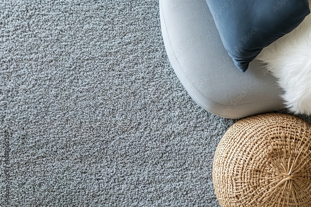 Poster high-resolution photography of a top-down view of a soft, grey carpet with a plush pile texture