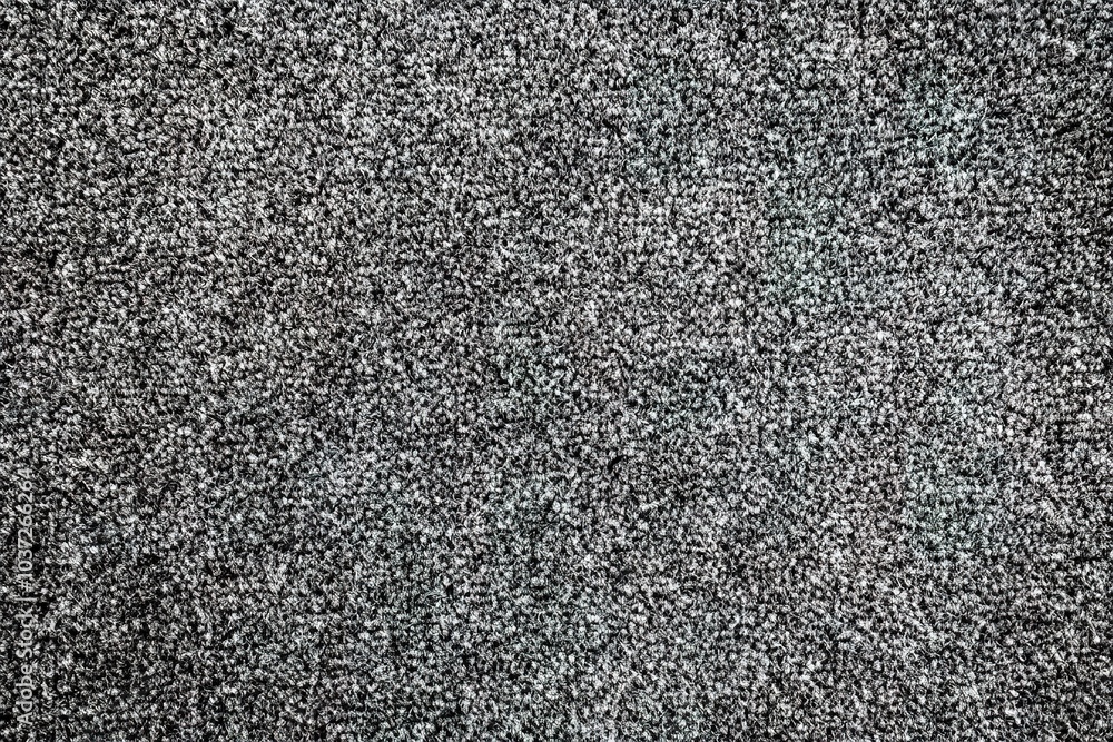 Poster high-resolution photography of a top-down view of a soft, grey carpet with a plush pile texture