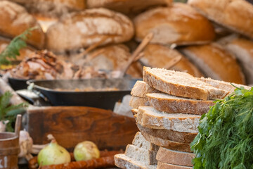 Fresh bread slices close-up at a Christmas market stall in Krakow, Poland