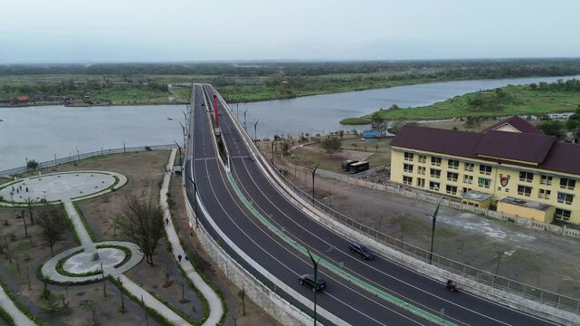 An aerial view of the new highway and large bridge near Parangtritis beach, Yogyakarta.