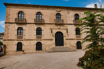 Historic European building with ornate architecture under clear sky