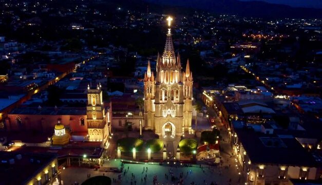 Night Aerial video of the Cathedral and old town of  San Miguel de Allende in Central Mexico