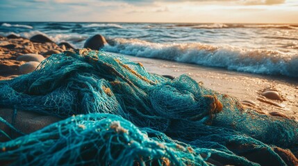 Tangled fishing nets litter the beach highlighting the pollution causing harm to nature