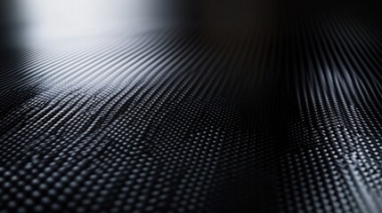 Metallic carbon background with a shiny, reflective surface and bold industrial detailing.