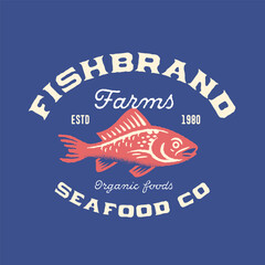 Vintage logo badge design for a seafood restaurant, fishing company or fish packaging. Retro hand drawn illustration of a beautiful fish. 