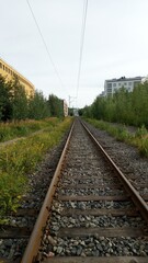 Obraz premium straight railway tracks, railway tracks in the distance