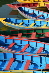 brightness  contrast colour of  traditional  boats in the phewa lake nepal