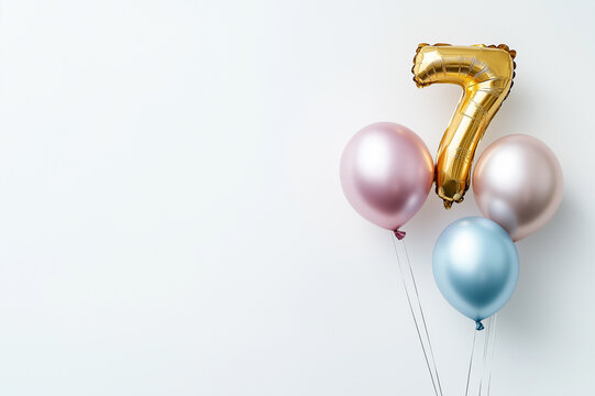 Gold number 7 balloon with pastel pink and blue balloons for seventh birthday celebration, party event decoration, or festive design setup with minimal and elegant aesthetic