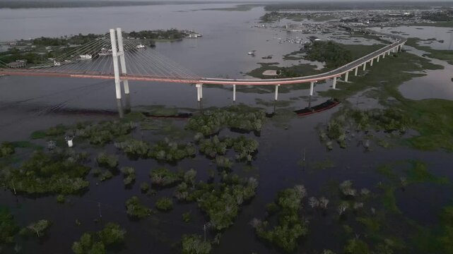 Aerial videos captured with drone of rivers surrounded by large Amazon rainforests, flooded forests of the jungle in the Amazon region of Peru, Amazon forests of Peru from the sky