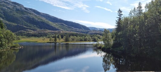 serene fresh water lake in summertime in northern Norway
