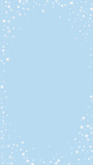 Fototapeta premium Falling snowflakes christmas background. Subtle flying snow flakes and stars on light blue winter backdrop. Beautifully falling snowflakes overlay. Vertical vector illustration.